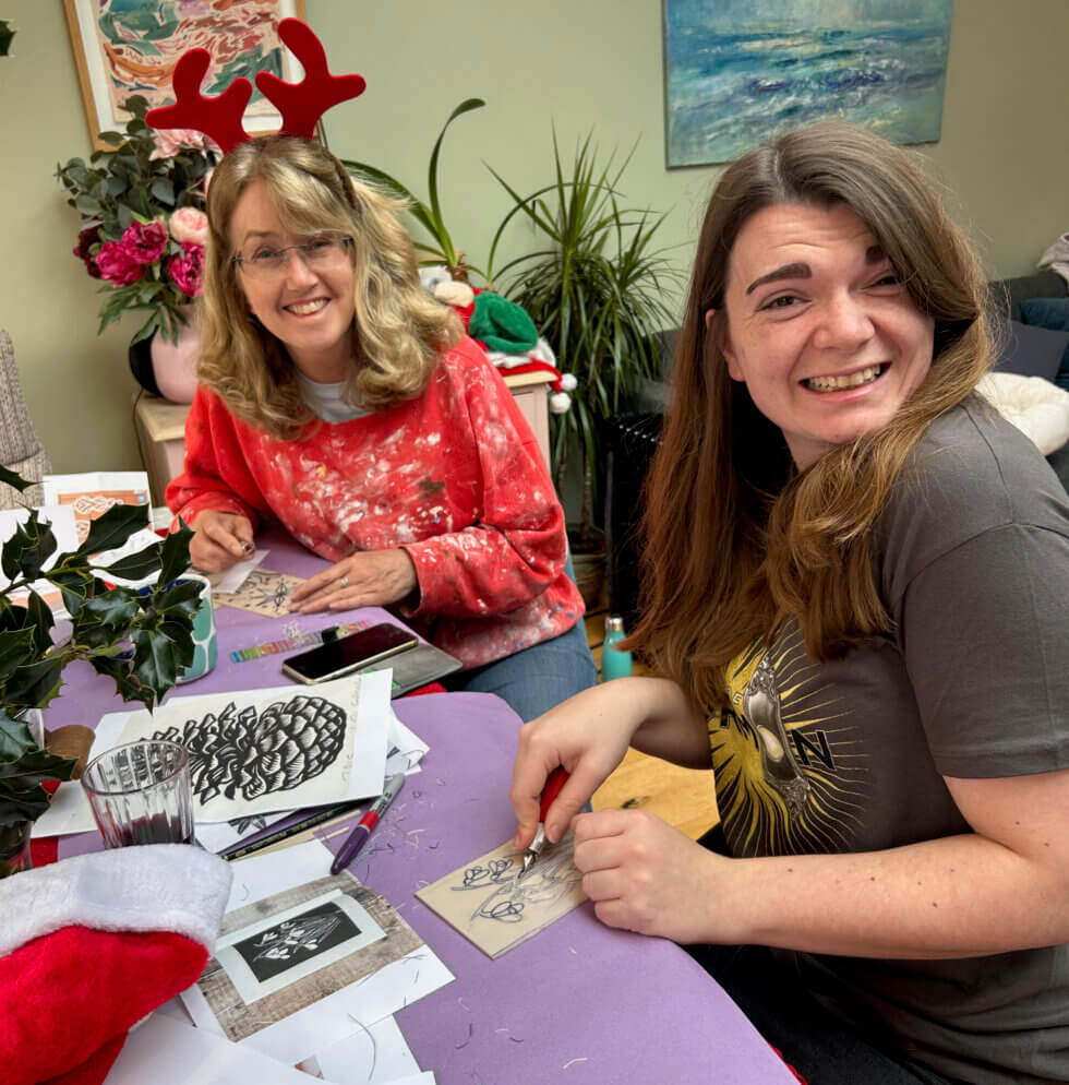 People making Christmas cards at a private party